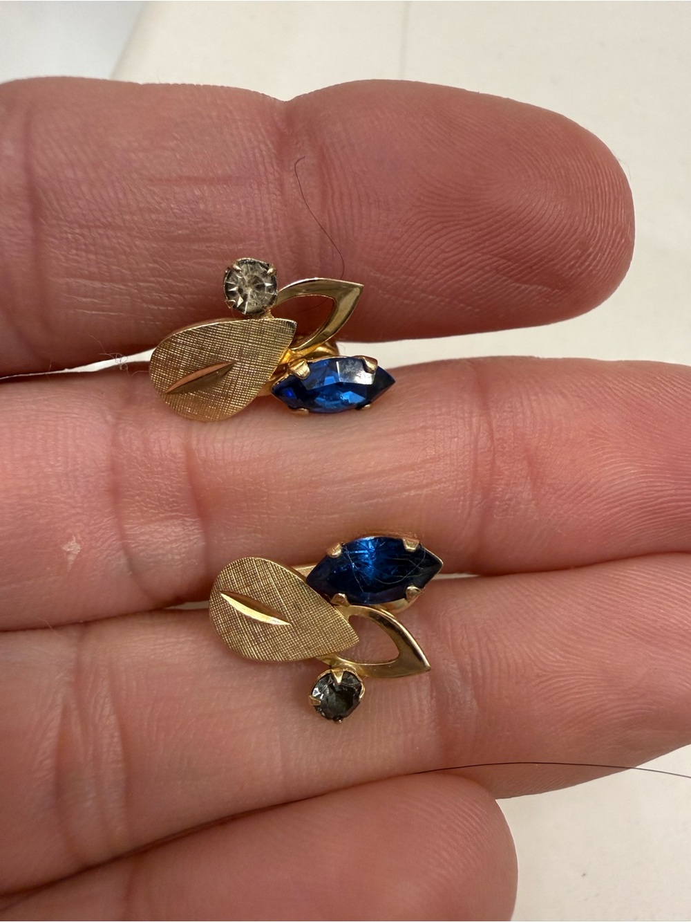 Gold-Tone Leaf Stud Earrings with Blue and Clear Stones